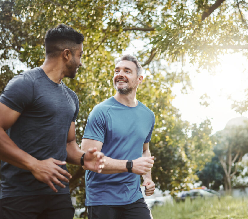 Running team, fitness and men in nature park with cardio, athlete and support for sports and health. Exercise friends, diversity and runner club, healthy and training for race outdoor with workout